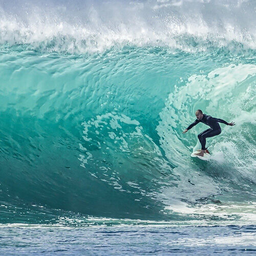 surfer on huge wave