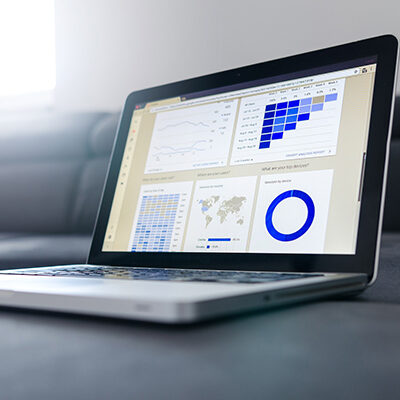 laptop with graphs and charts